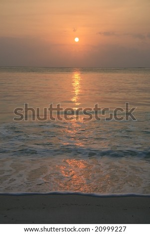 Photo of an african sunrise over the sea.