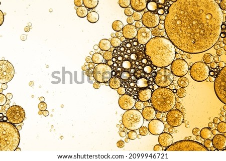oil drop floating on the water.  holiday light background. holiday postcard background.