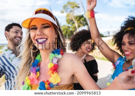 Carnaval in Brasil, fun woman dancing at brazilian party in costume
