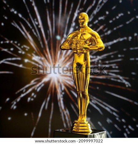 Hollywood Golden Oscar Academy award statue. Success and victory concept.