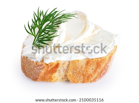 Toasted bread with cream cheese and dill isolated on white background. With clipping path. Royalty-Free Stock Photo #2100035116