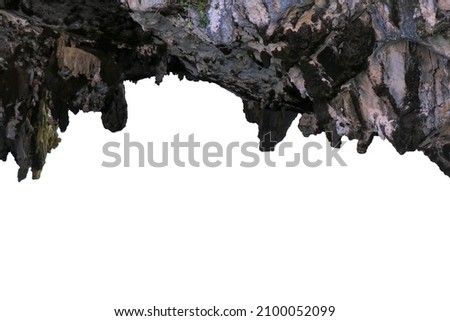 Cave entrance, stalactites rocks, cave mouth stone isolate on white clipping path Royalty-Free Stock Photo #2100052099