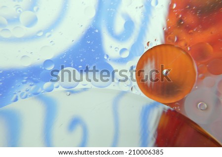 Abstract with swirls and oily bubbles
