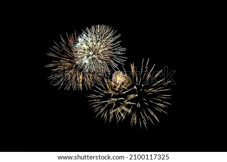 yellow fireworks. Bright festive fireworks for birthday, holiday or Christmas on a black background. Isolated