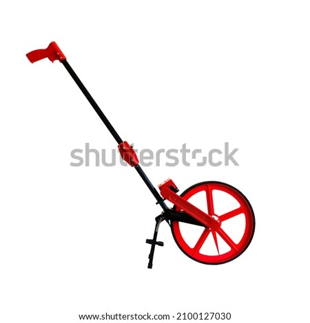 Distance measuring wheel device. Measuring wheel tool for calculating distance isolated on white background Royalty-Free Stock Photo #2100127030