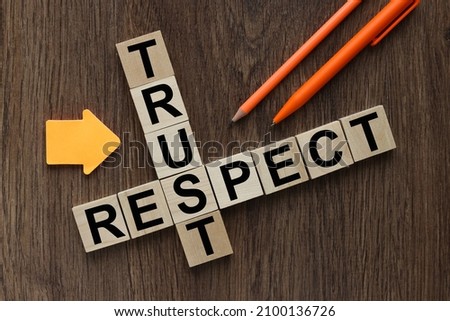 respect word written on wood block. respect text on table, concept. Royalty-Free Stock Photo #2100136726