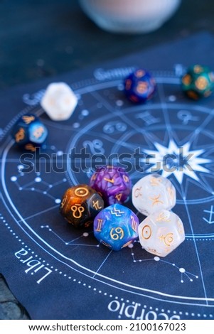 Horoscope zodiac circle with divination dice. Fortune telling and astrology predictions concept, magic rituals and exoteric experience Royalty-Free Stock Photo #2100167023