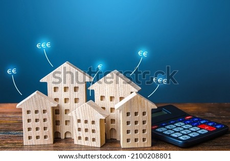 Residential buildings with euro price tags and calculator. Property valuation. Investment business plan. Market study. Calculating mortgage. Prices comparison for renting apartments. Housing value. Royalty-Free Stock Photo #2100208801