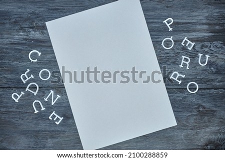 A studio photo of a letter board letters