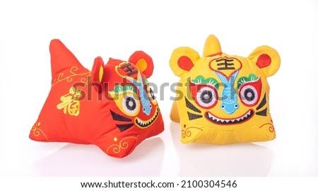 Traditional Chinese cloth doll tiger,2022 is year of the tiger,Chinese characters on tiger translation: good bless.