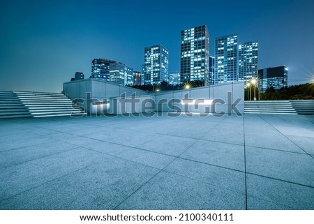 Panoramic skyline and modern commercial office buildings with empty floor in Beijing, China.