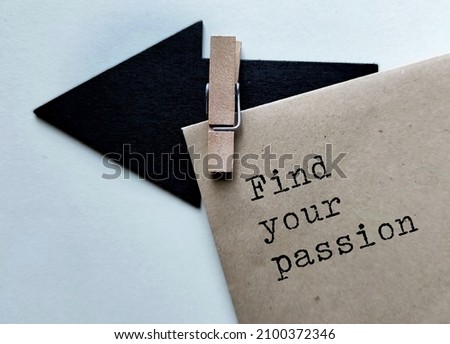 Black direction arrow with craft envelope and typed text FIND YOUR PASSION, means finding something you’re passionate about and do it for a living Royalty-Free Stock Photo #2100372346