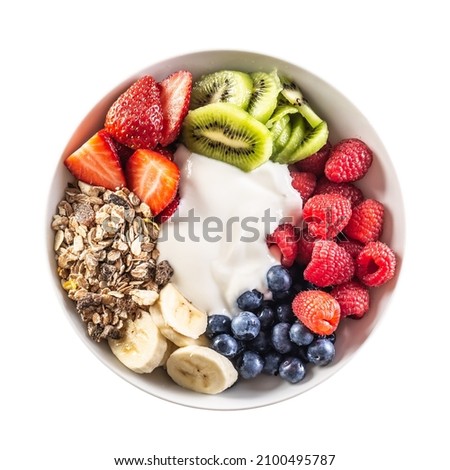 Top view of isolated fruit and yoghurt bowl with cereals, kiwi, strawberries, banana, blueberries and raspberries. Royalty-Free Stock Photo #2100495787