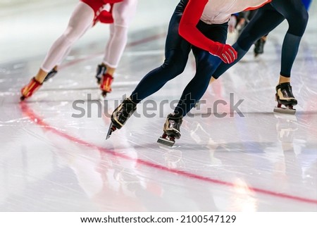 legs group athletes skaters in speed skating