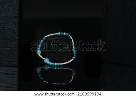 precious gem bracelet on a black background