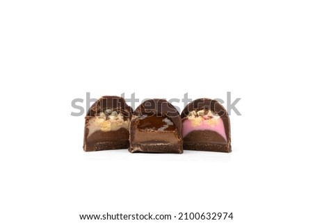 Collection of assortment of chocolate candies isolated on white background.