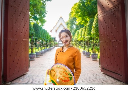 Thai women wearing traditional Thai costumes