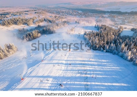 Drone View at Ski SLope in kotelnica, Zakopane, Poland at Cold Sunny Winter Day. Royalty-Free Stock Photo #2100667837