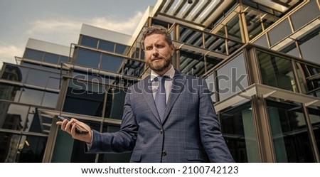 having problem. adult ceo with cellphone. phone call. mobile connection technology. vexation. frustrated businessman hold smartphone. man boss has conversation. business negotiation. Royalty-Free Stock Photo #2100742123