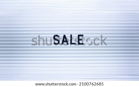 The concept of discounts and sales. Inscription Sale on the LED panel. Minimalism.