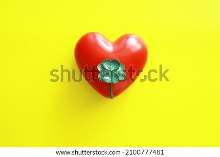 St. patrick's day background. Religious Christian Irish celebration. Four-leaf clover symbol of good luck with shape of heart.