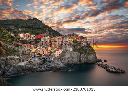 Manarola, La Spezia, Italy coastal view in Cinque Terre at dawn.