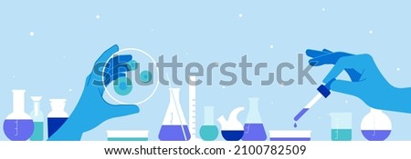 Equipment for chemical laboratory. Researcher holding a laboratory petri dish. Test tube, flasks tube and other measuring. Illustration for chemical or medicine experiment, research. Royalty-Free Stock Photo #2100782509