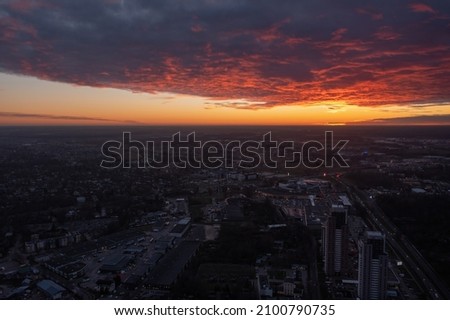 Sunrise Over the City Lights of Colorado Springs Royalty-Free Stock Photo #2100790735