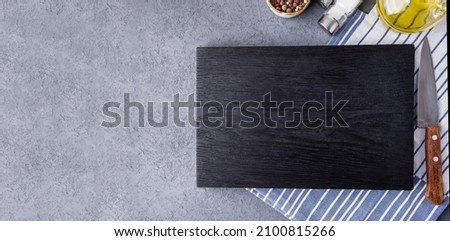 Empty wooden board with spices. Top view, copy space