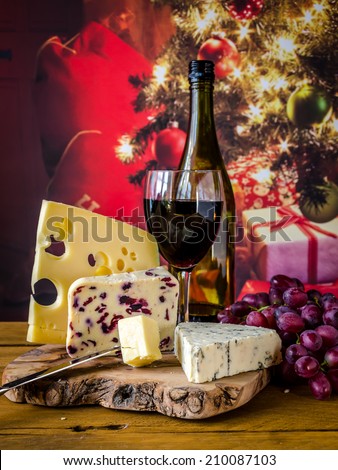 Christmas cheese and wine Royalty-Free Stock Photo #210087103