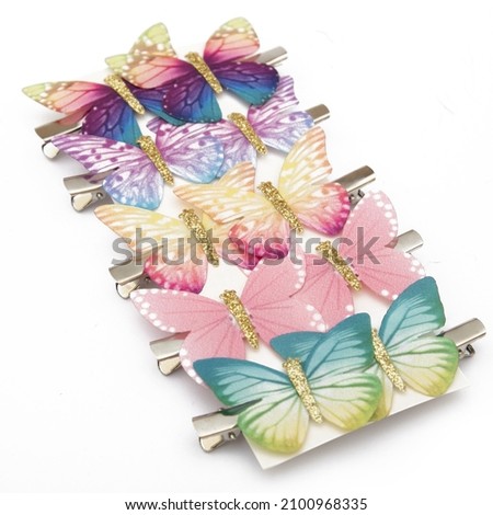 Butterfly clips for young children Royalty-Free Stock Photo #2100968335