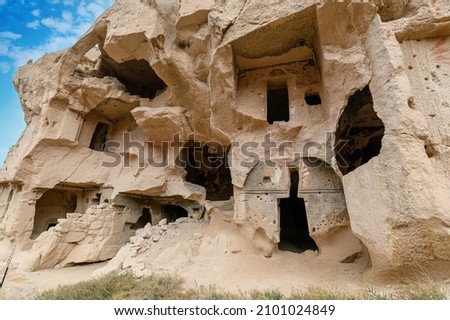 Zelve Open Air Museum in Goreme, Cappadocia, Turkey. Cave town and houses at rock formations. Royalty-Free Stock Photo #2101024849
