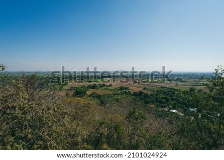 High angle view rice farm with sky and highway at countryside in phichit province thailand