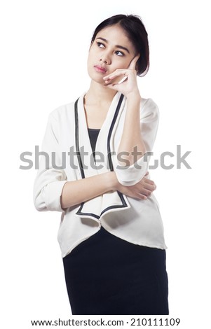 Portrait of asian businesswoman thinking isolated on white background