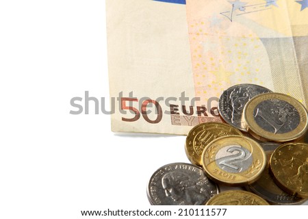 Money euro coins and bills close up isolated on white