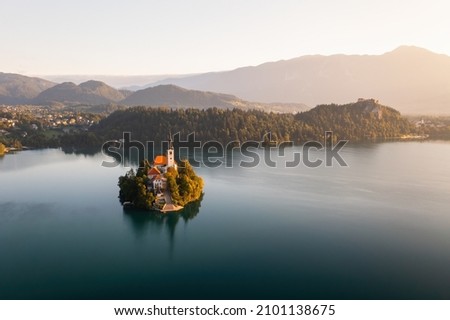 Island with church on it with Slovenian Julian apls in background