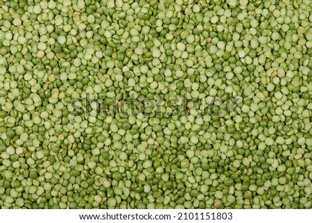 Dry split green peas texture background Royalty-Free Stock Photo #2101151803