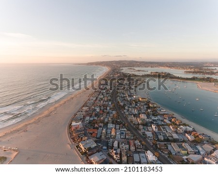 An aerial shot of the shore of San Diego, California, surrounded by the ocean