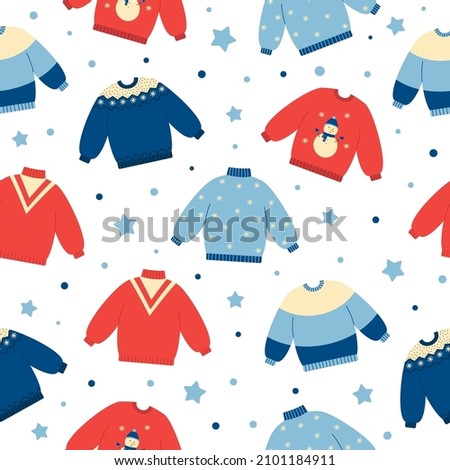 Seamless pattern of warm colorful sweaters on white background. Winter or autumn clothing background. Doodle style. Christmas holidays mood.