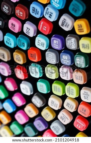 A set of markers for drawing in different colors for sketching with markings. Close-up