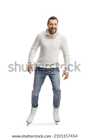 Casual young man ice skating sitting and smiling isolated on white background