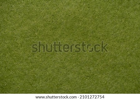 Green felt as background or texture. Royalty-Free Stock Photo #2101272754