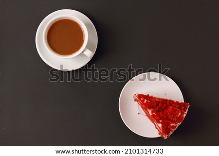 A cup of coffee with cake, an invigorating drink in the morning, home comfort.
