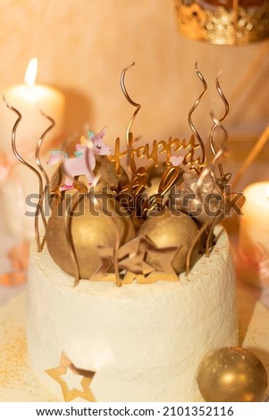 birthday cake with candles out of focus photo

