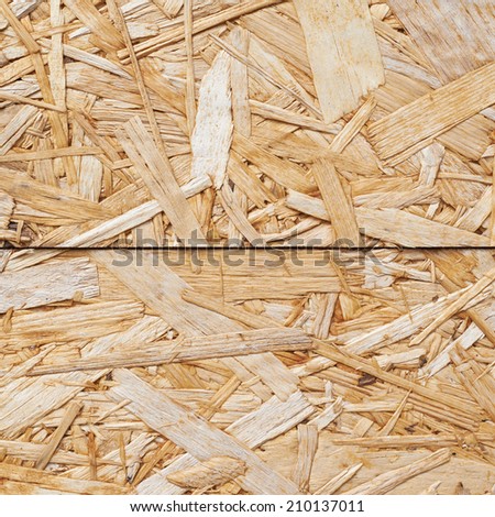 Surface made of pressed wooden shavings as an abstract background composition