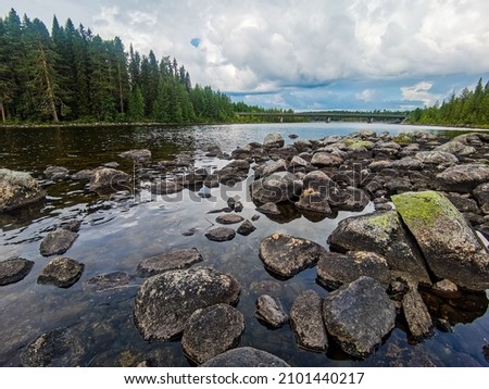 lake in the mountains sky and clouds, beautiful photo digital picture , picture taken in Sweden, Europe , Digital created image Picture