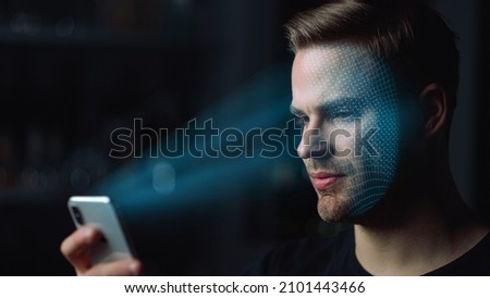 Smartphone face recognition system identifying personality unlocking error. Man cellphone user try unlock device using modern biometrical verification. Biometric avatar mobile technology concept Royalty-Free Stock Photo #2101443466