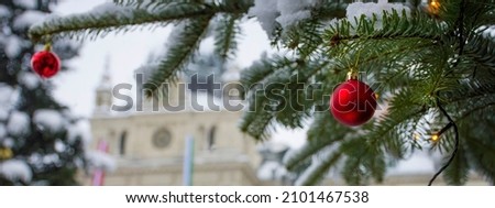 Christmas tree detail and Town Hall building at famous main square Hauptplatz , in winter, in the city center of Graz, Steiermark region, Austria. Selective focus