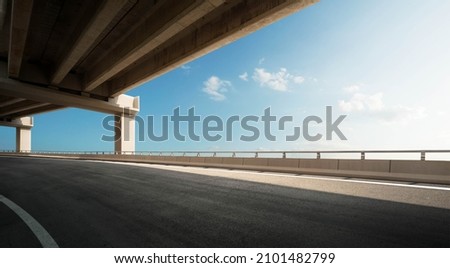 side view of highway overpass with nature beautiful blue sky. Royalty-Free Stock Photo #2101482799