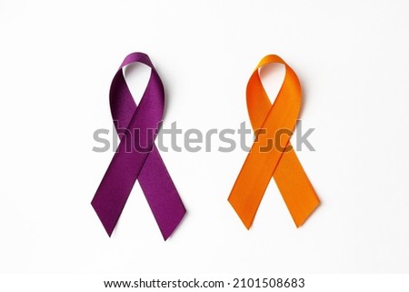February awareness month campaign with purple and orange ribbon Royalty-Free Stock Photo #2101508683